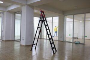 ladder in the middle of an office renovation